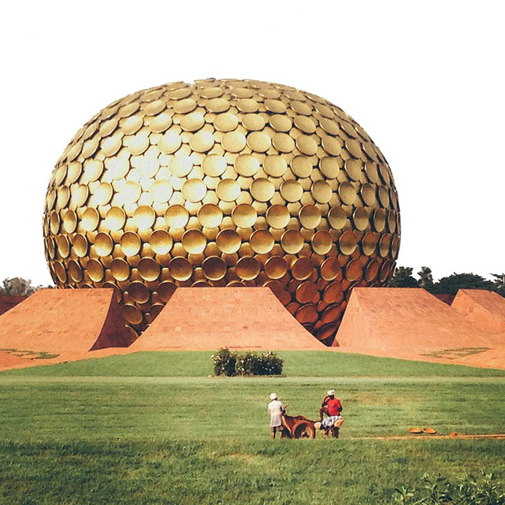 The Matrimandir Lake is rooted in Auroville’s regional commitment to developing an area-wide innovative water management system. In the monsoonal months of rainfall in Tamil Nadu, 90% annual precipitation occurs in just two months and water storage is a crucial challenge. The geomembrane’s installation is a critical process, immediately following the fine grading of the slopes to prevent damage from rain. The lake’s shores will store one billion liters of rainwater over ten months and are carefully designed with a 1:3 slope, reinforced with large concrete blocks. The slopes are meticulously smoothed and compacted before the HDPE waterproofing layer is installed, to ensure zero water loss.