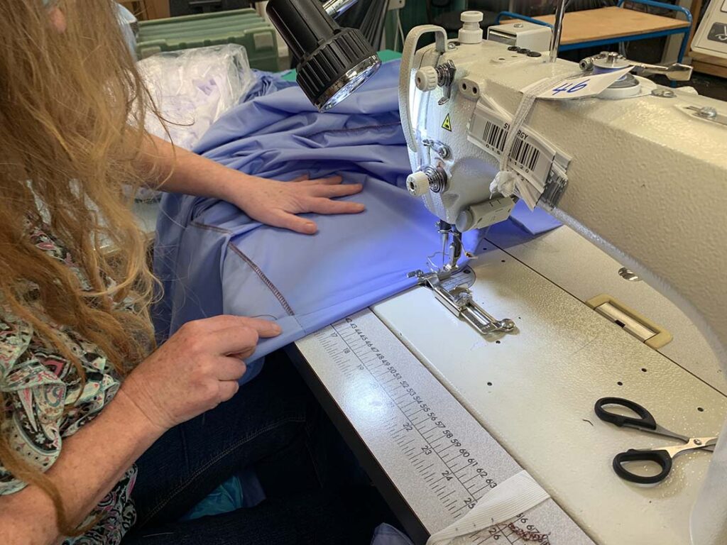 Holly Morris is challenging the thinking around the repair of medical textiles and PPE pointing to studies that show that patching a hole in a surgical gown or drape does not increase the risk of contamination or patient infection. Photo courtesy of Holly Morris