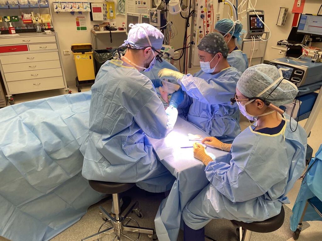 Surgeons using disposable surgical gowns, as Holly Morris challenges the mindset around the necessity for single-use medical textiles. Photo courtesy of Holly Morris